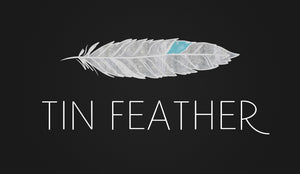 tin feather lipstick logo